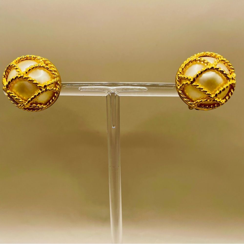 Vintage Joan Rivers textured gold tone caged pearl clip on earrings. Signed.